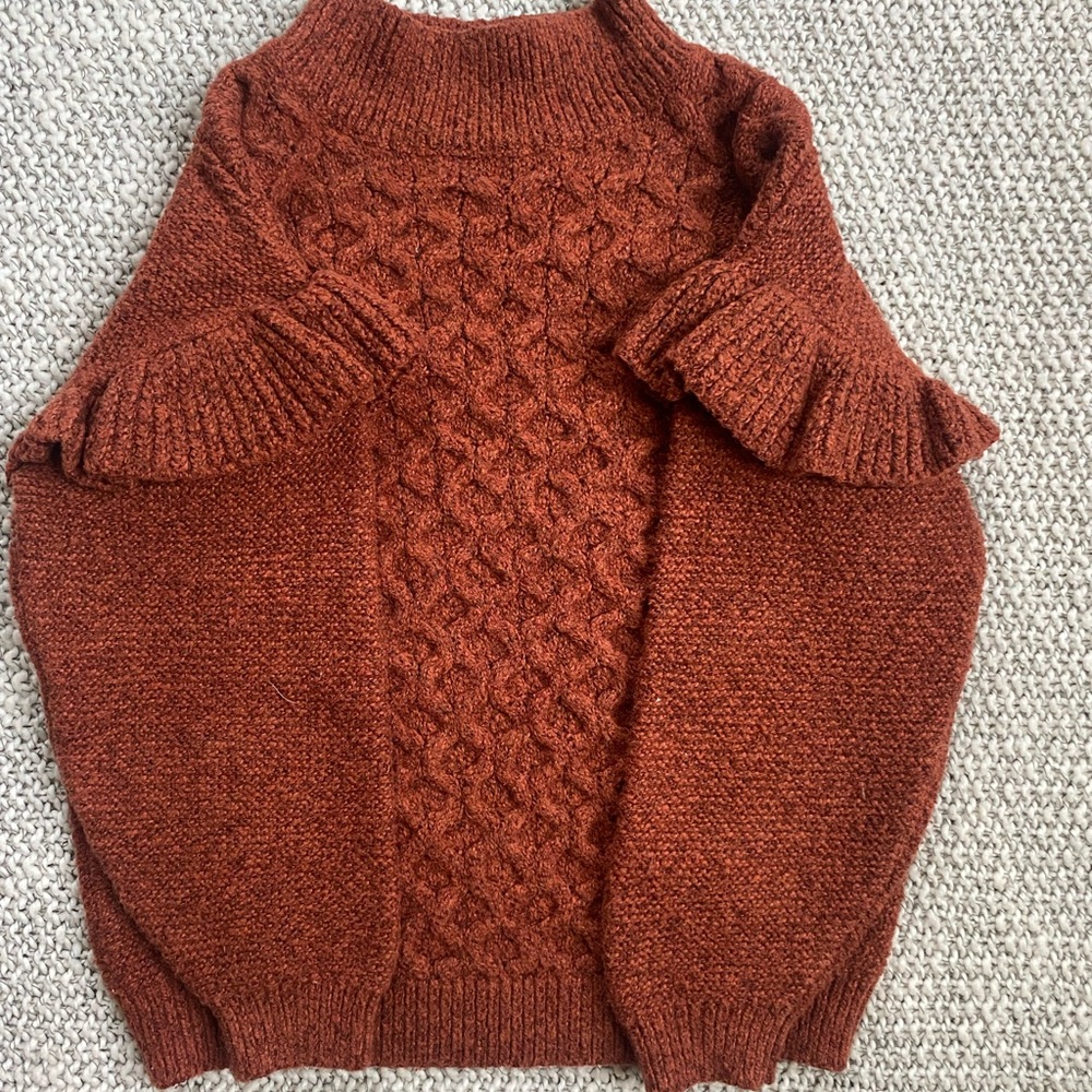 Orange knitted sweater